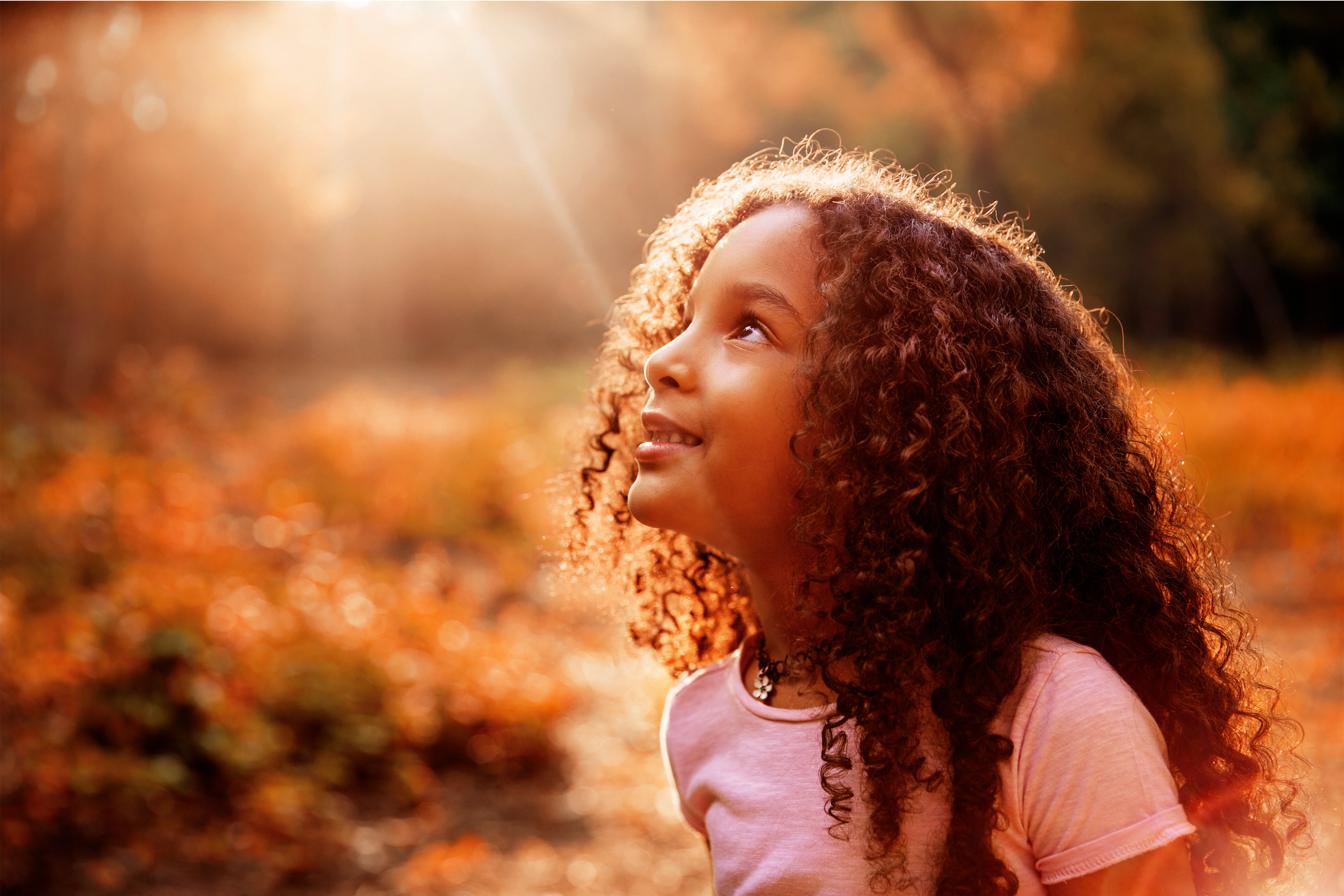 Young Child looking at the Sky